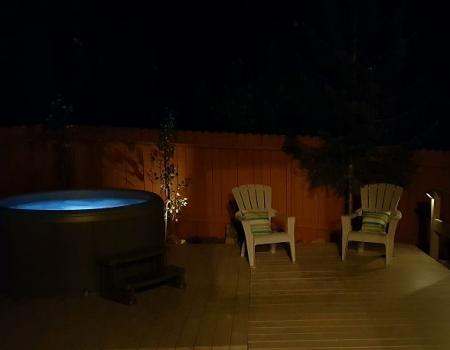 hot tub lit up in the dark